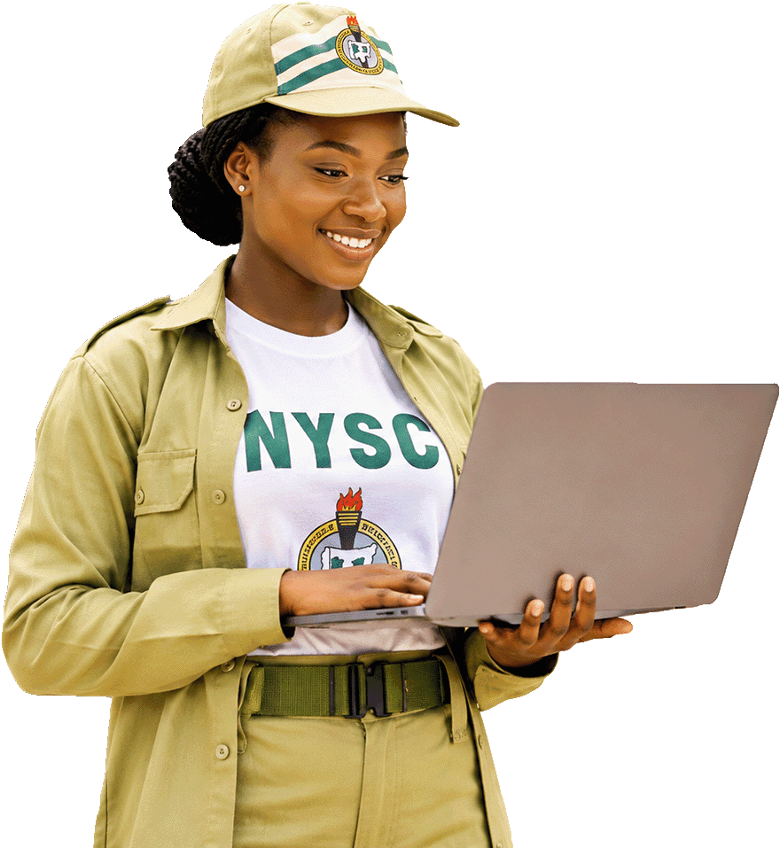 Corps member celebrating while holding a laptop